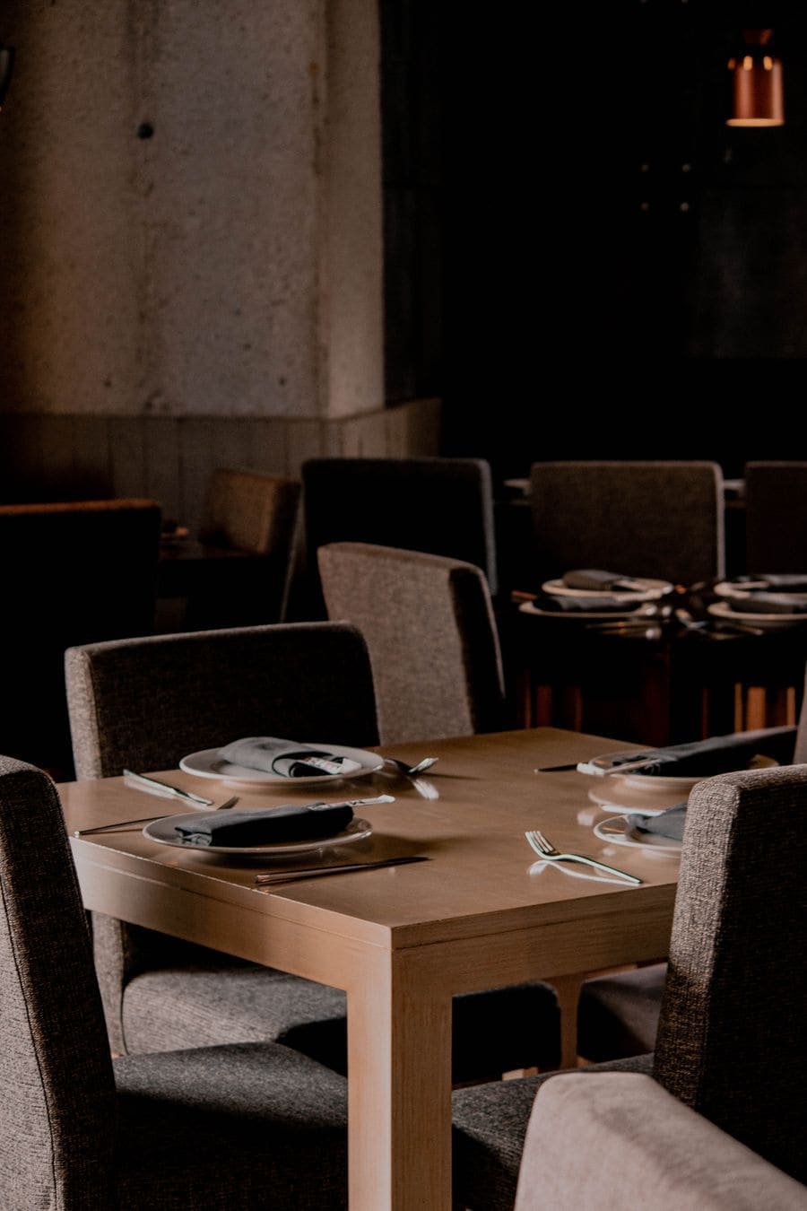 Set tables in a dark, quiet room