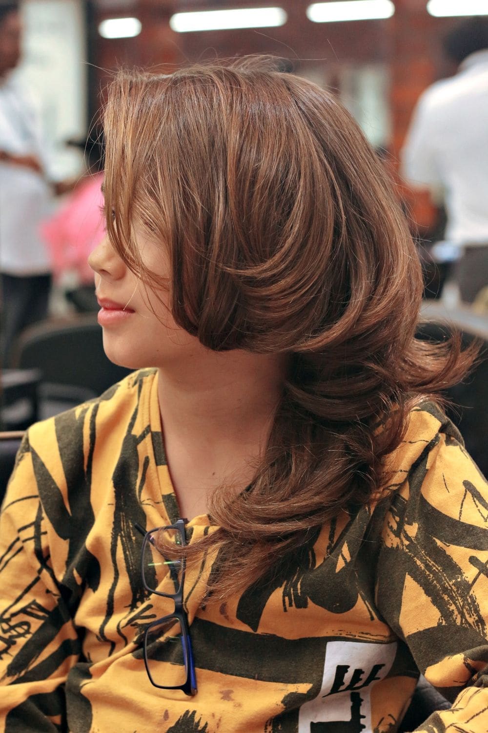 Glossy shoulder-length hair with a soft bend