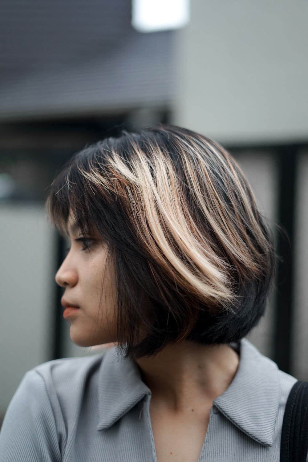 A choppy bob with bright face-framing highlights